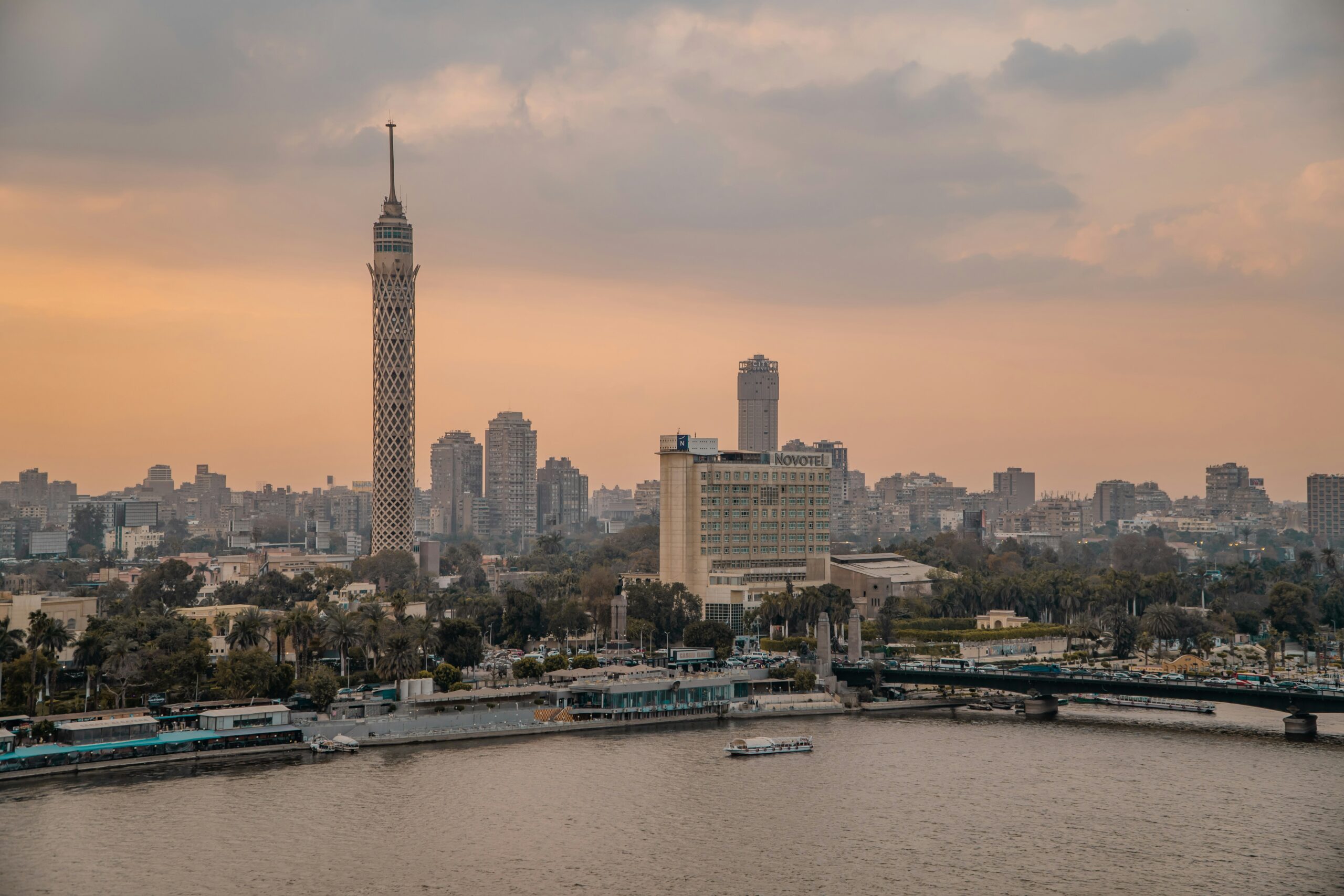 Aerial view of Cairo with the Nile River, showcasing the city’s skyline and landmarks